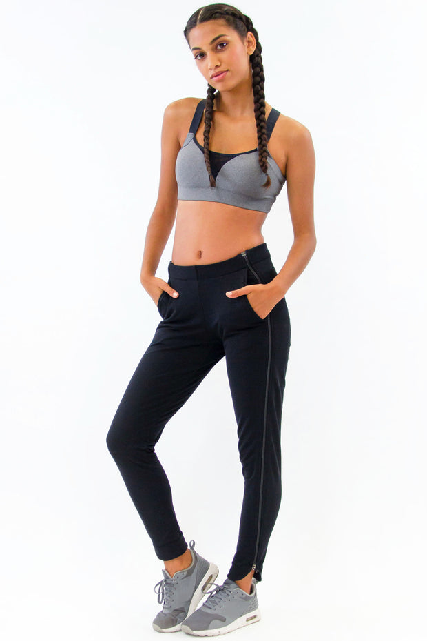 Rare Active modern tearaway pants for women in black. 