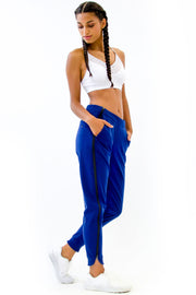 Rare Active modern tearaway pants for women in deep blue. 