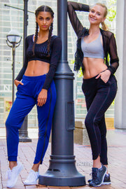 Models wearing Rare Active modern tearaway pants for women.